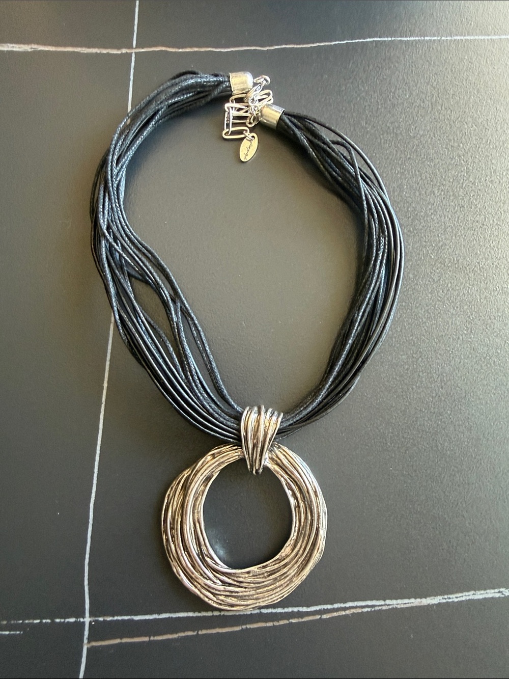 Free People Black Multi-Strand Necklace with Textured Silver Ring Pendant
